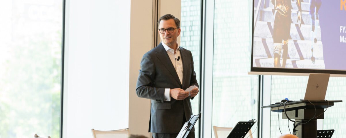 Speaker presenting at an international conference in Prague