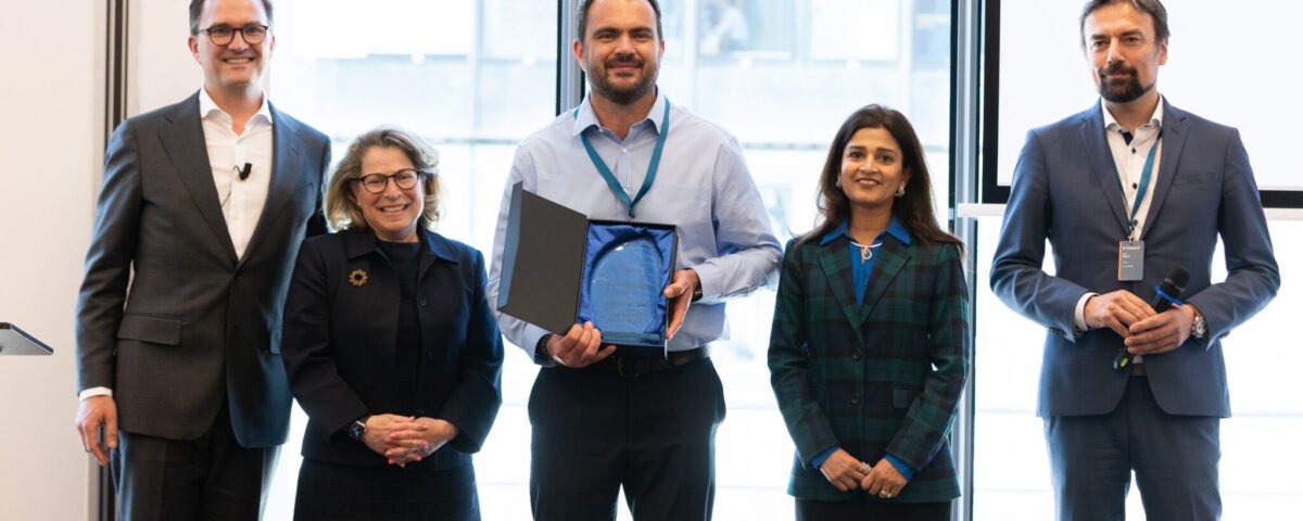 Group award presentation at a corporate ceremony in Prague