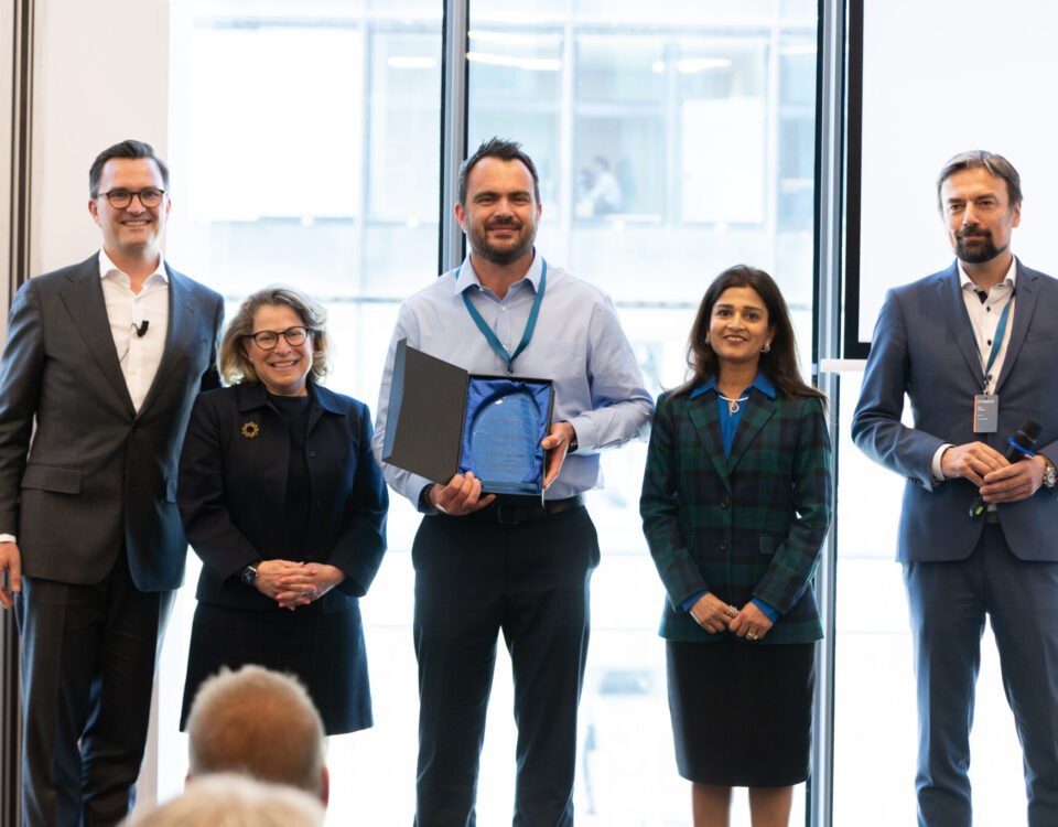 Group award presentation at a corporate ceremony in Prague