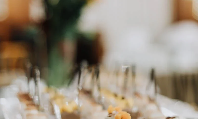 Dessert and flower detail at a Prague gala dinner