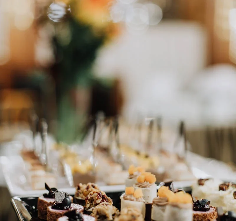 Dessert and flower detail at a Prague gala dinner