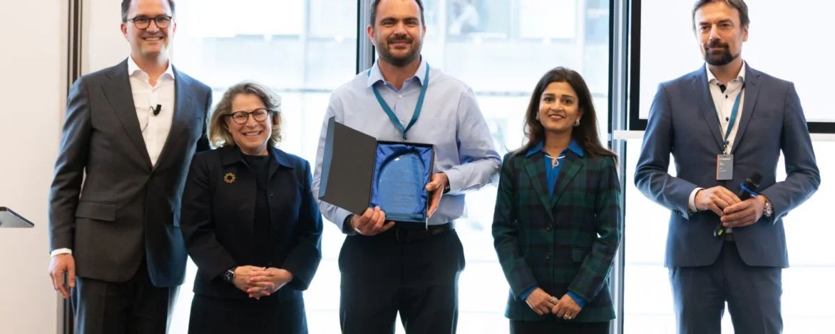 Award presentation at a corporate event in Prague
