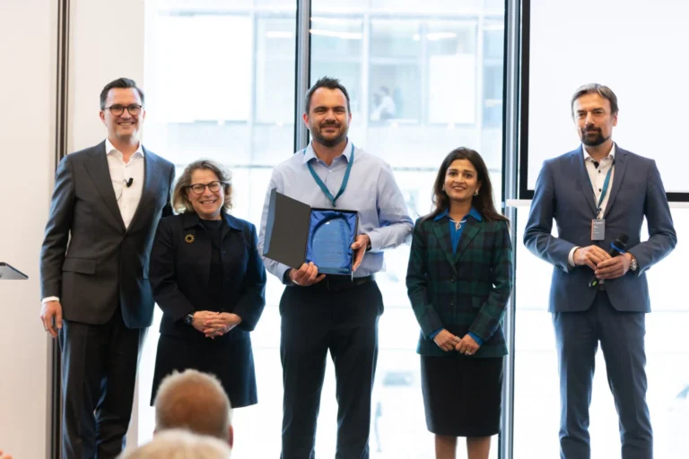 Award presentation at a corporate event in Prague