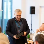 Award moment during a corporate dinner in Prague