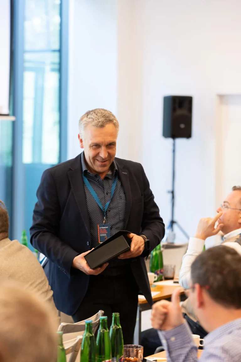 Award moment during a corporate dinner in Prague
