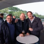 Guests networking at an outdoor reception in Prague