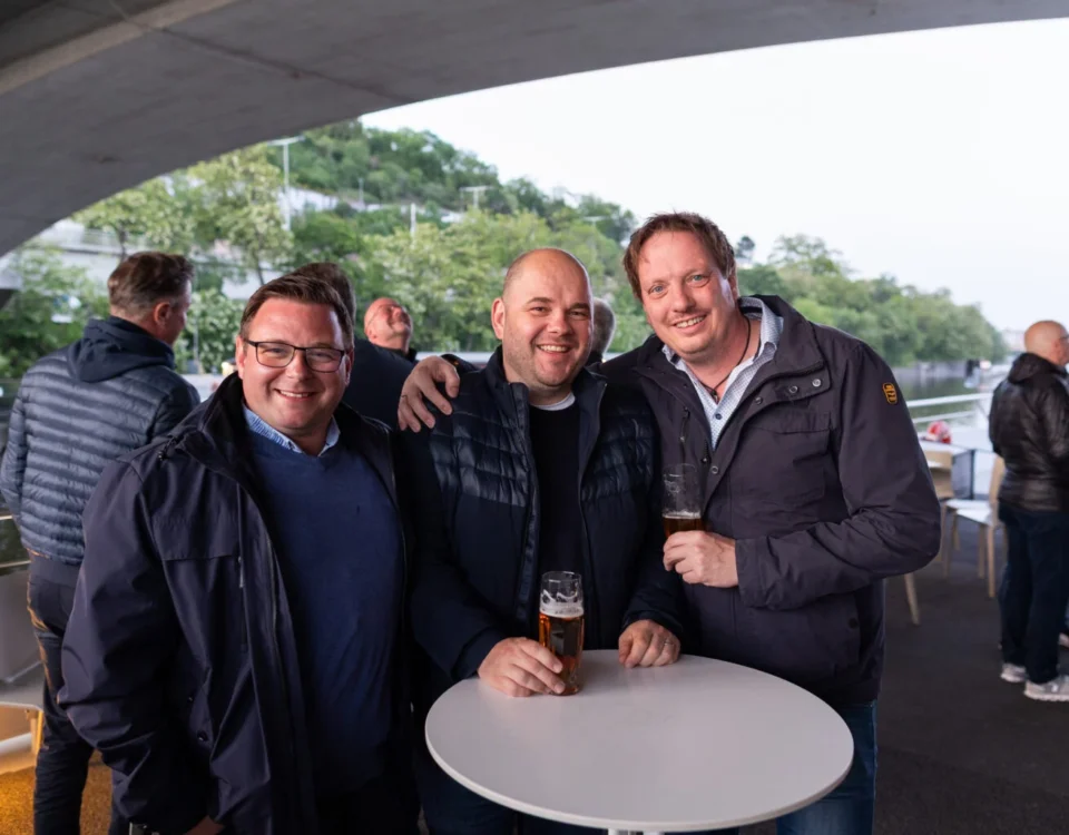 Guests networking at an outdoor reception in Prague