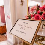 Gala dinner signage with floral decoration in Prague