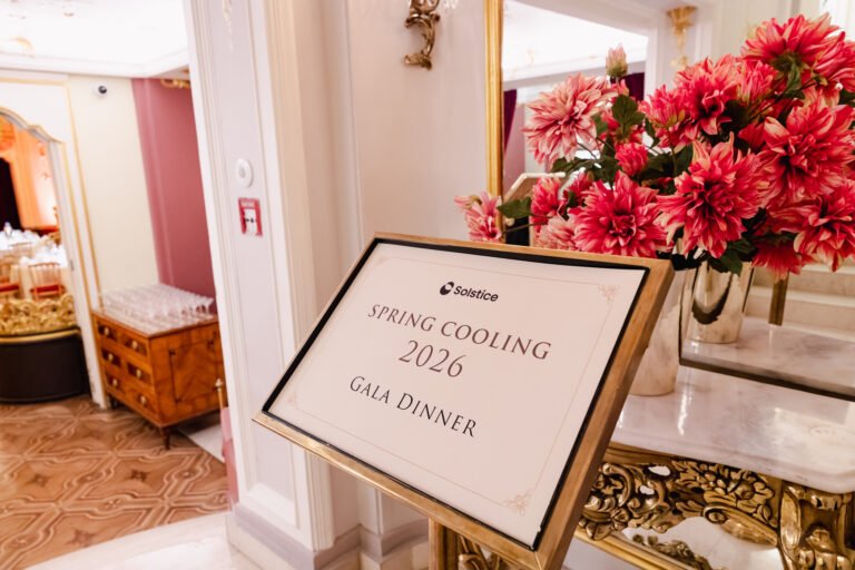 Gala dinner signage with floral decoration in Prague