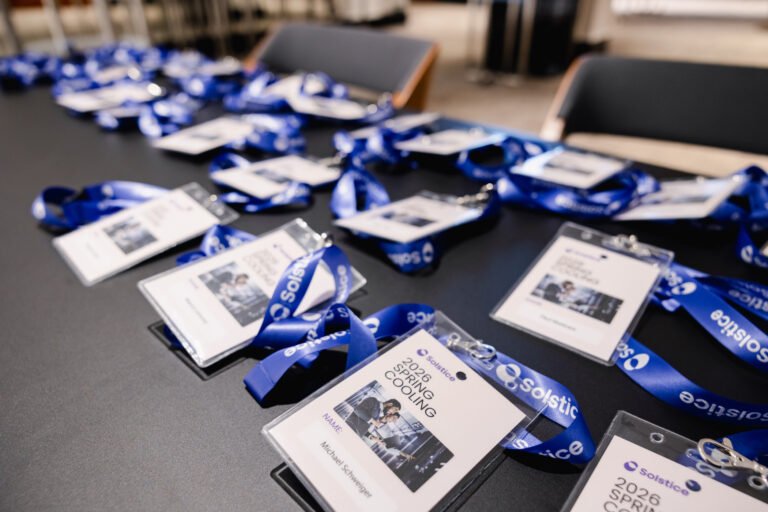 Branded delegate materials on the table at a Prague corporate event