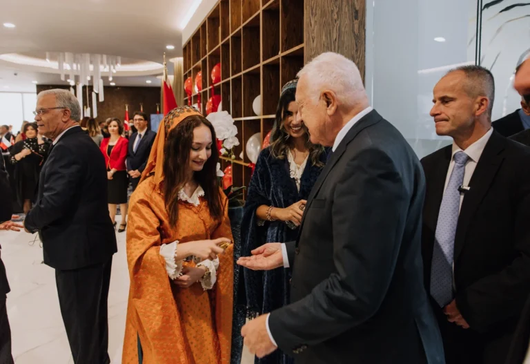 Guests greeting hosts at a diplomatic reception in Prague