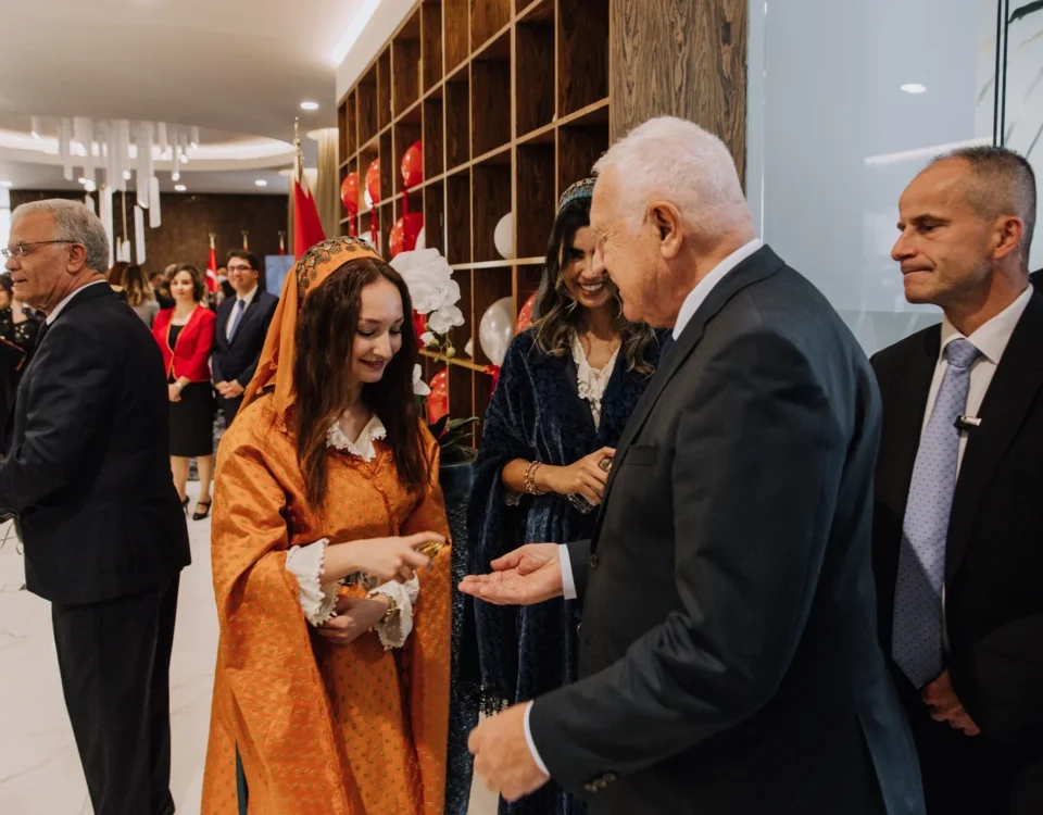 Guests greeting hosts at a diplomatic reception in Prague