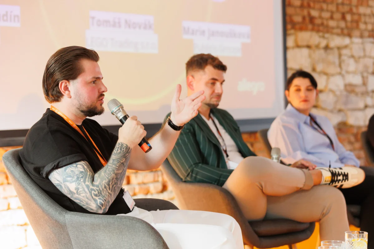 Panel discussion on stage at the Allegro Brand Day in Prague