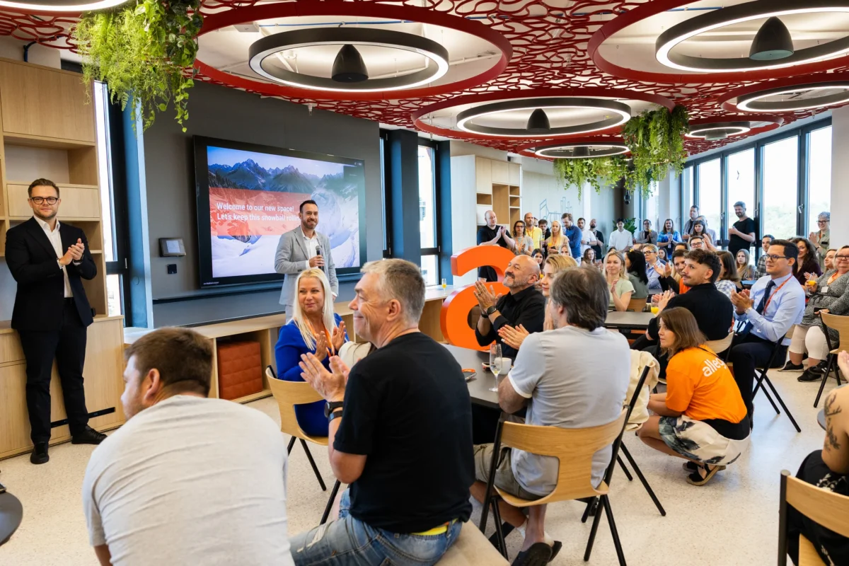 Employees seated for the opening speeches in Allegro's new Prague office
