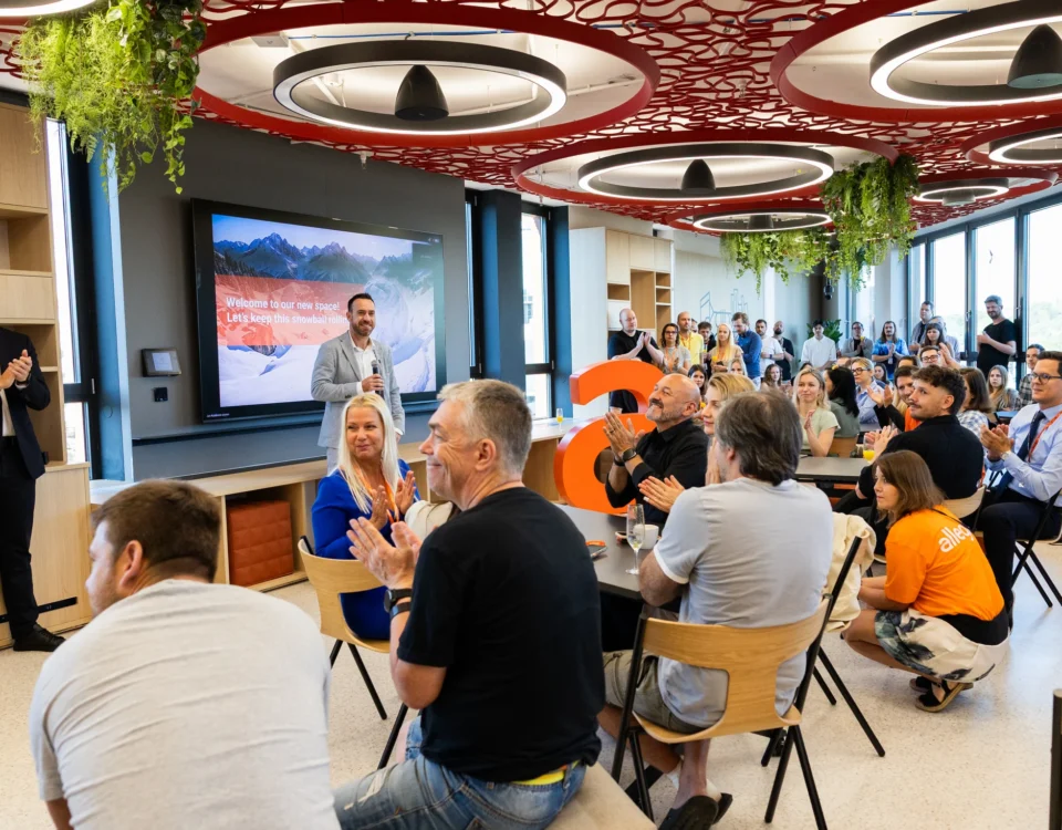 Employees seated for the opening speeches in Allegro's new Prague office
