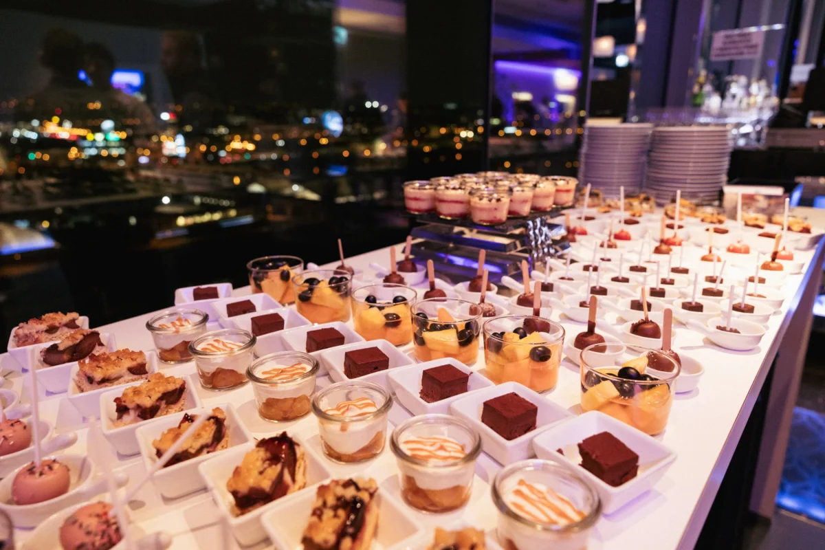 Dessert buffet with a night view of Prague at Hilton Prague Atrium