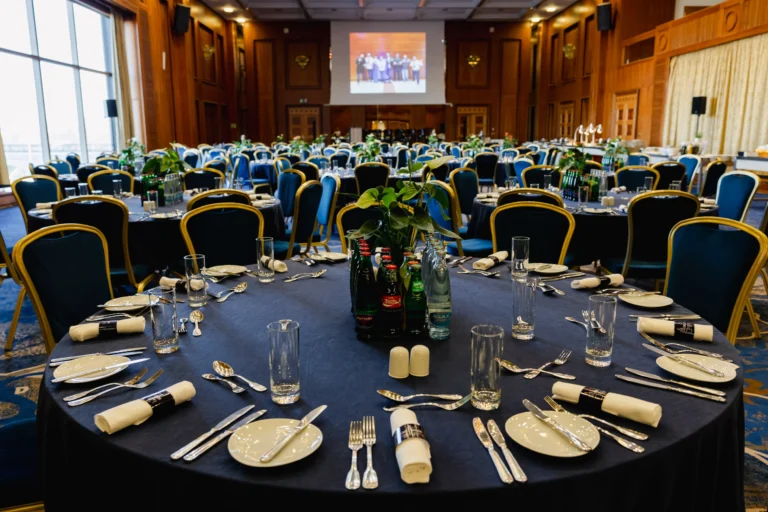 Breakout room set with round tables for a company kick-off at Hilton Prague Atrium