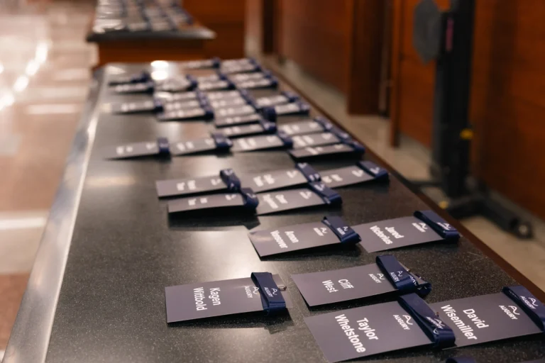 Name badges laid out at registration at Hilton Prague Atrium