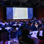 Full main hall during a session at Hilton Prague Atrium